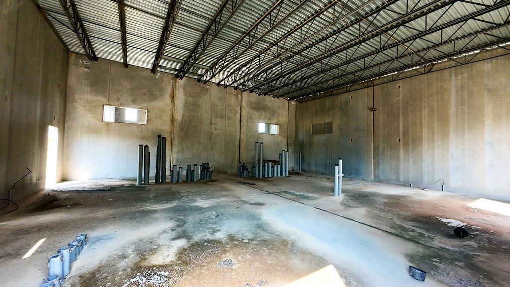 Clear-span interior and existing utility risers