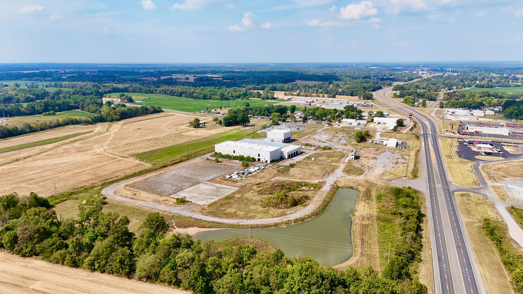 Aerial overview of the industrial site and highway access