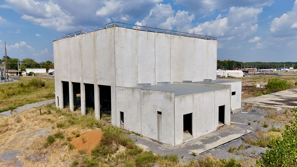 Concrete tilt-wall building and attached lower structure